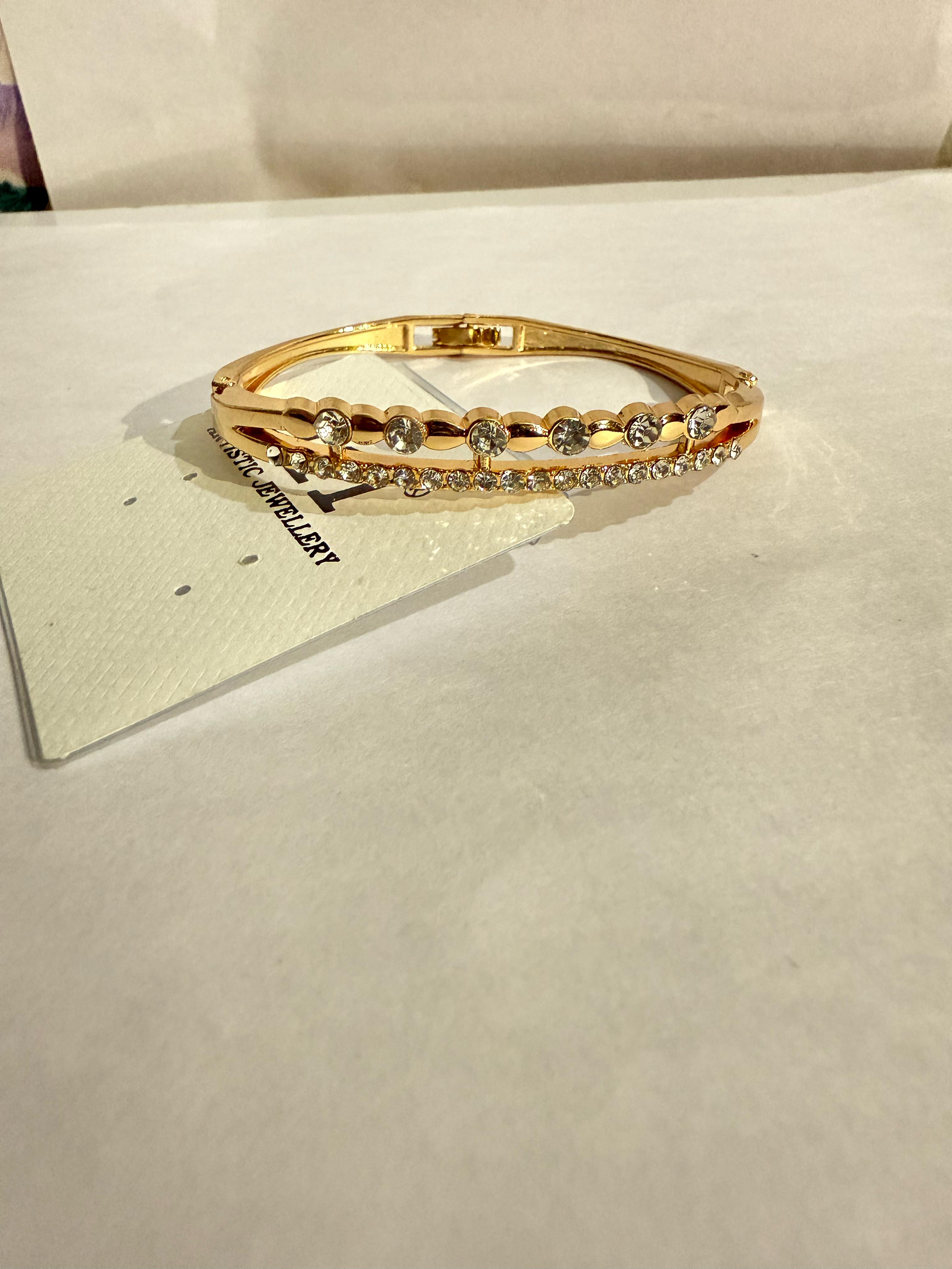 Elegant Gold-Plated Bangle with Clear Stones