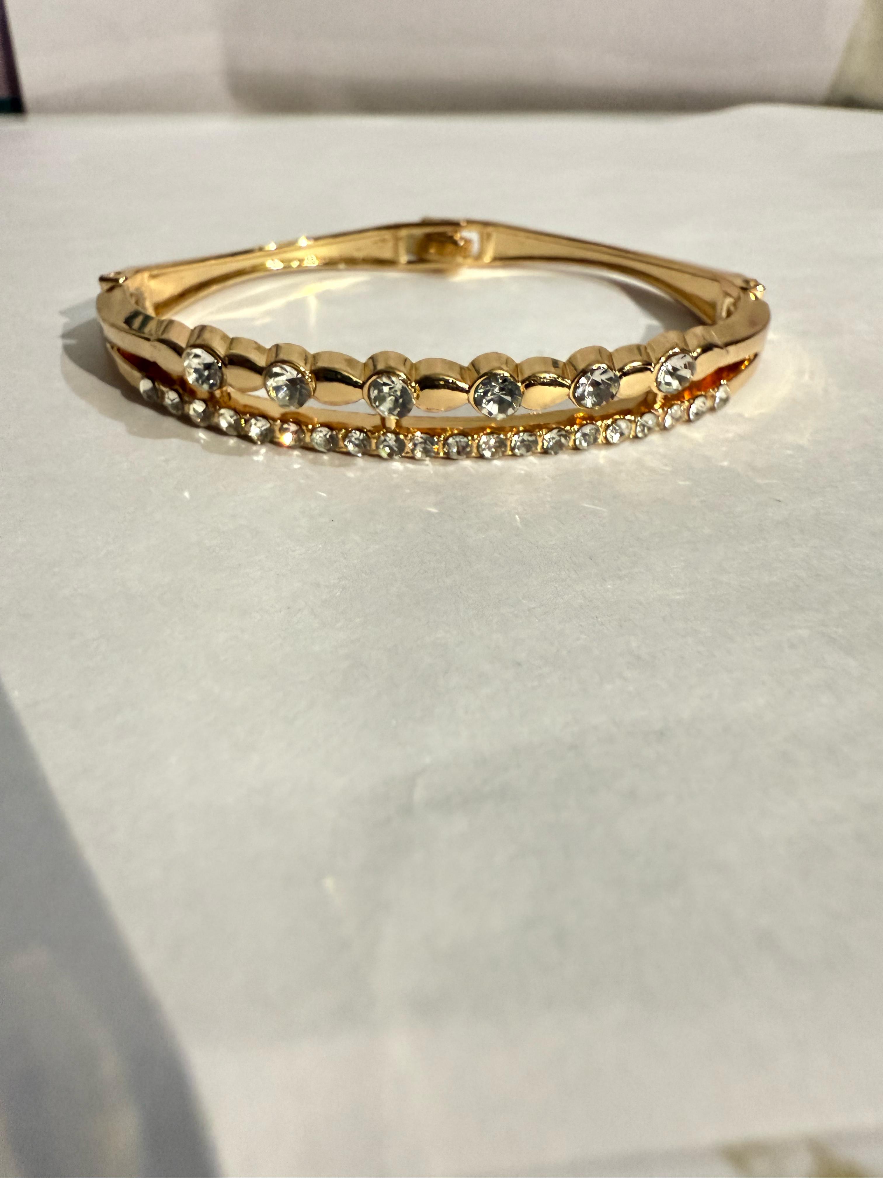 Elegant Gold-Plated Bangle with Clear Stones