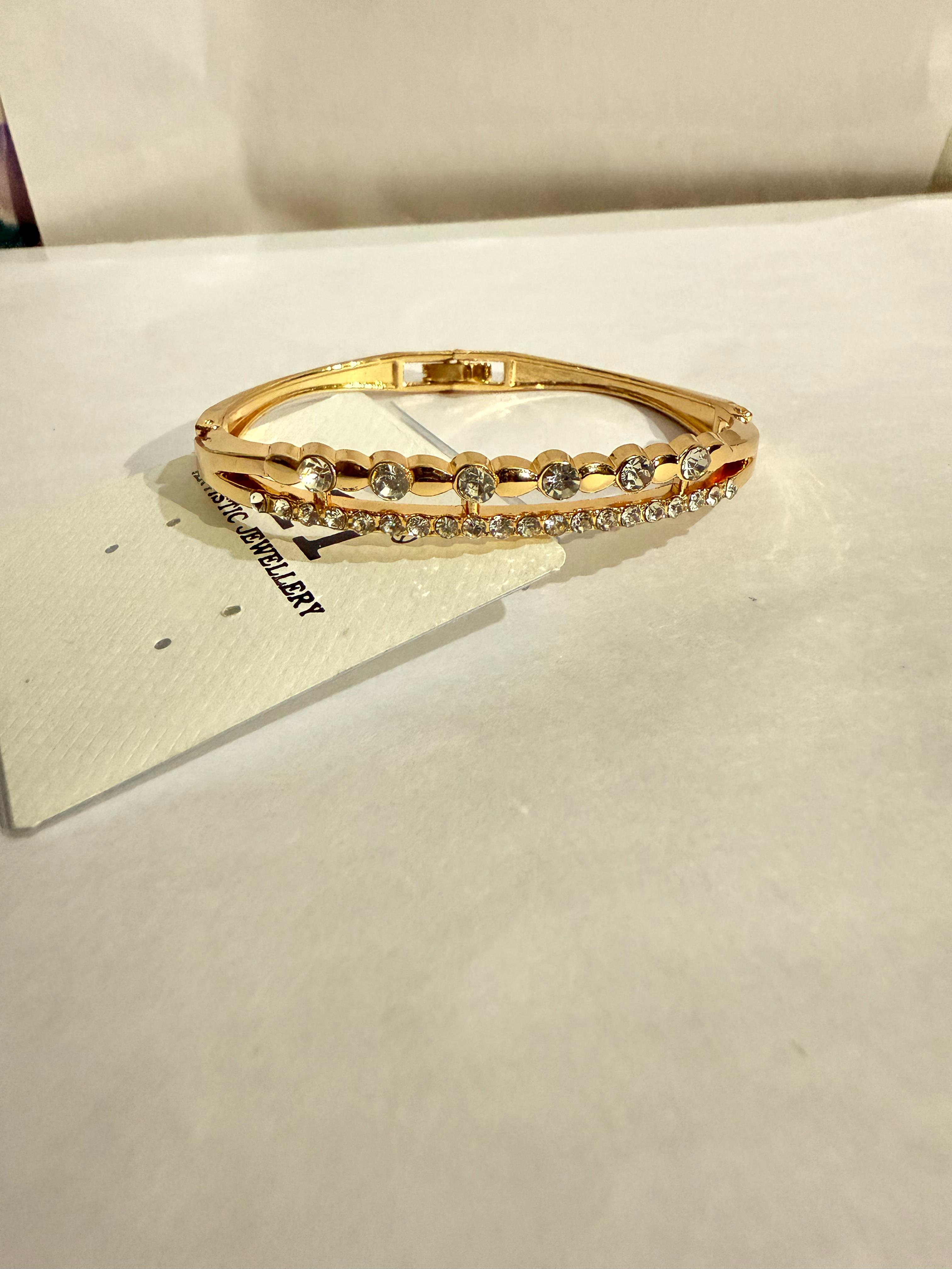 Elegant Gold-Plated Bangle with Clear Stones