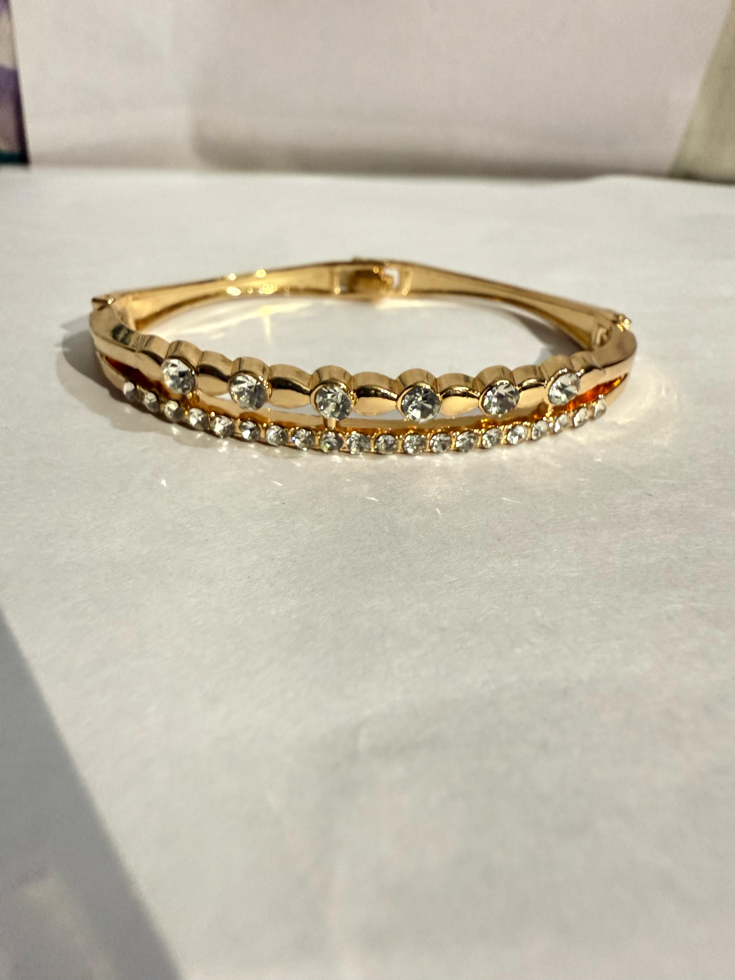 Elegant Gold-Plated Bangle with Clear Stones