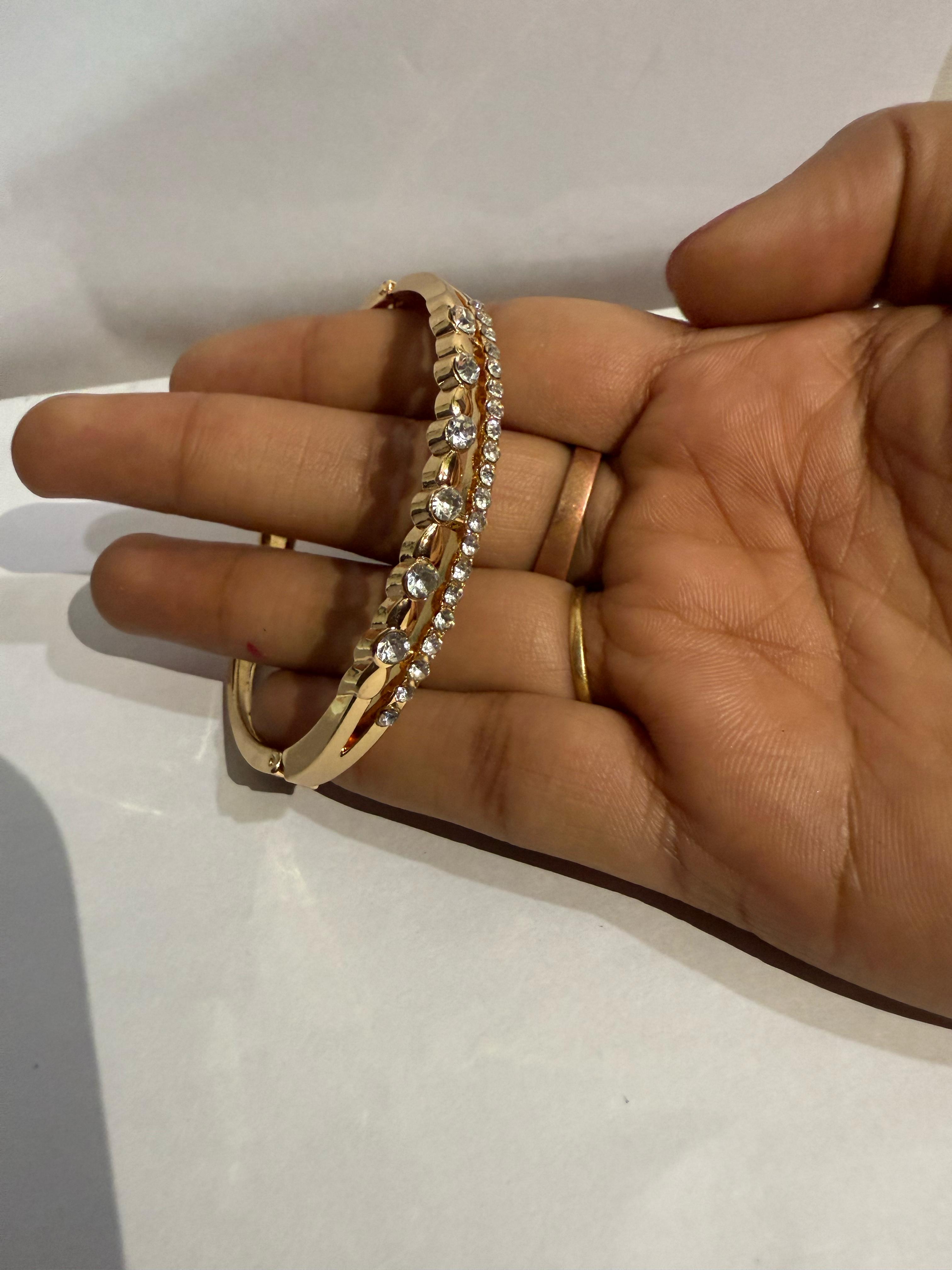 Elegant Gold-Plated Bangle with Clear Stones