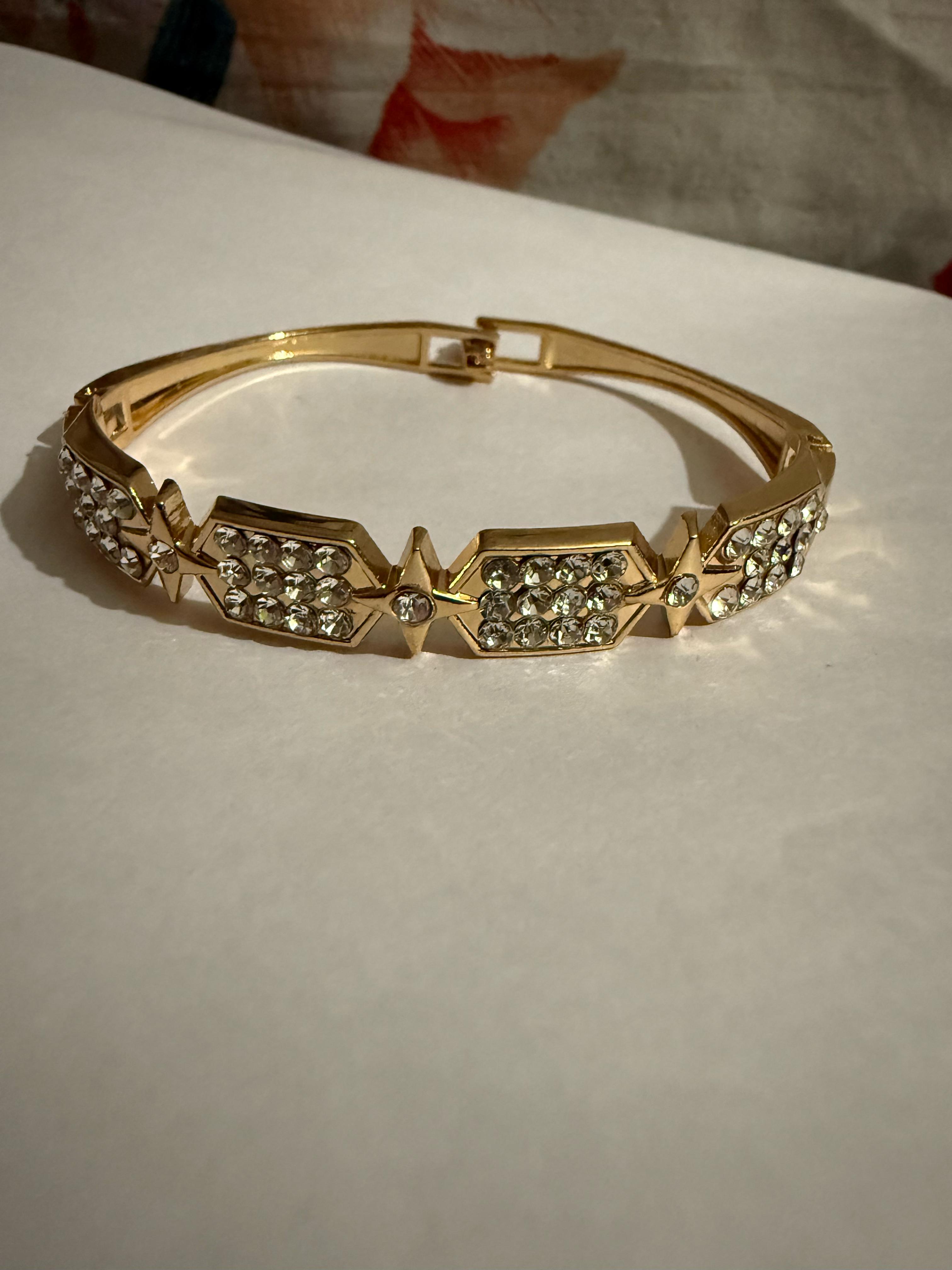Elegant Gold-Toned Bangle with Cubic Zirconia Stones - Perfect for Any Occasion