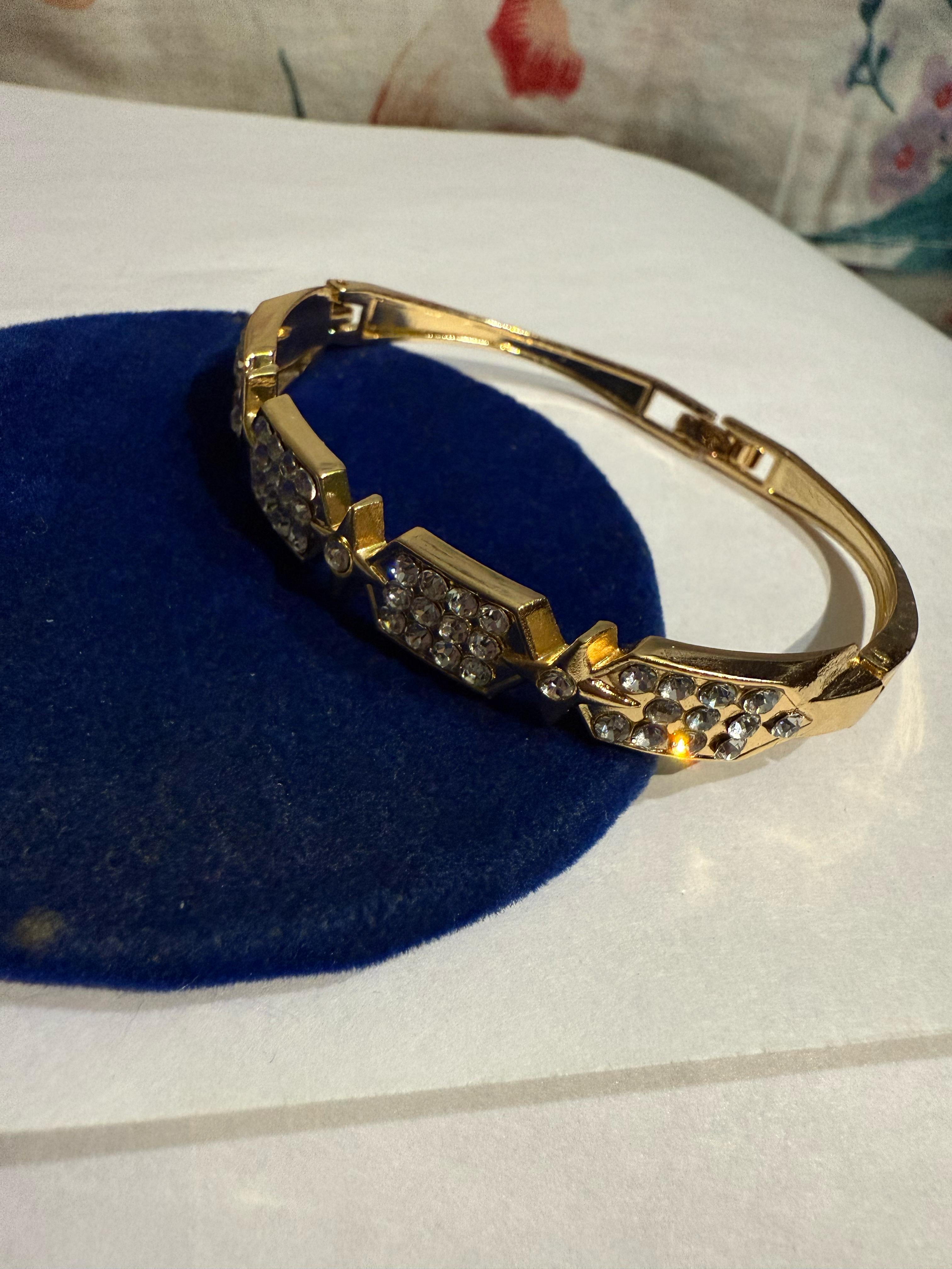Elegant Gold-Toned Bangle with Cubic Zirconia Stones - Perfect for Any Occasion