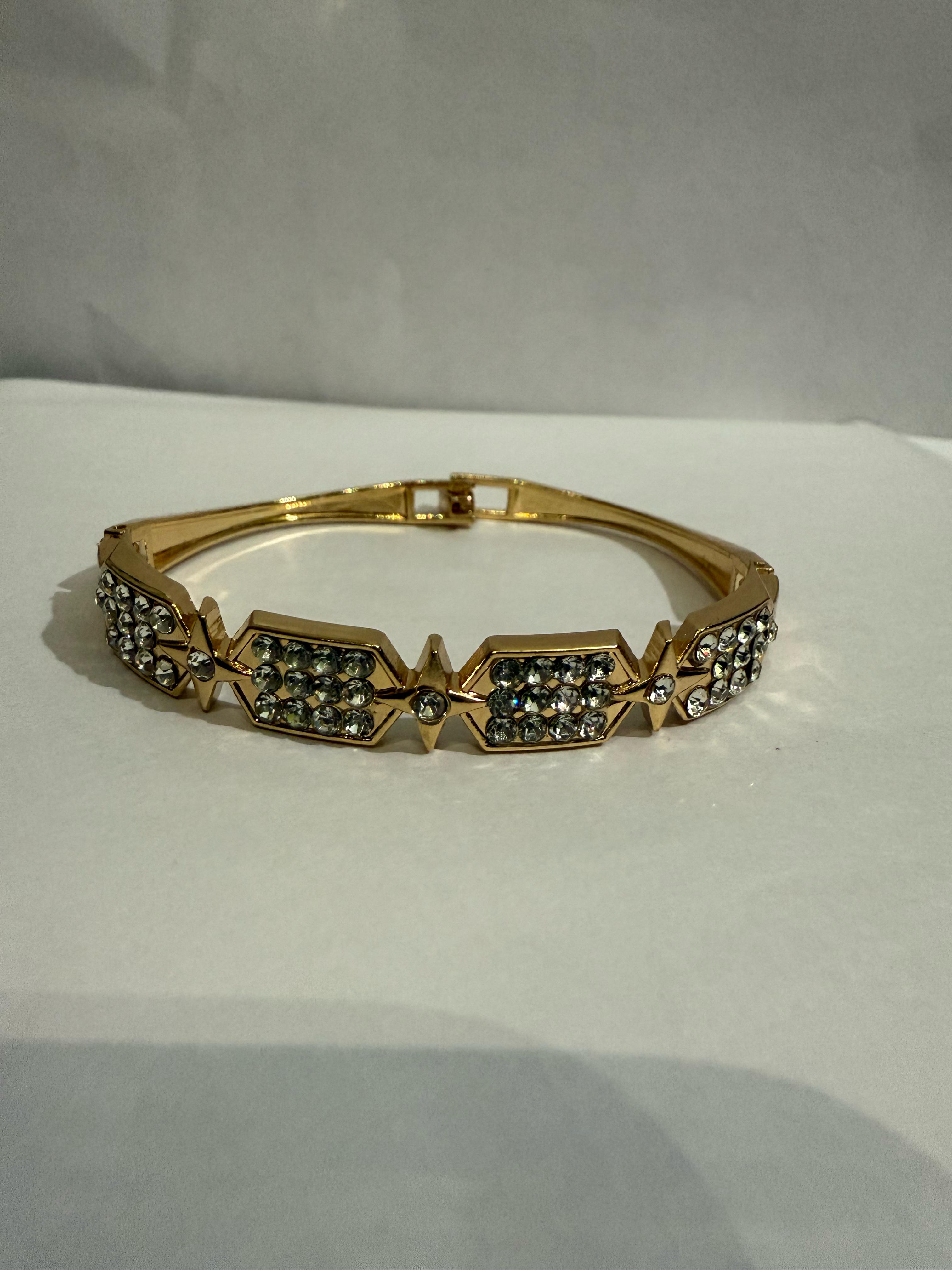 Elegant Gold-Toned Bangle with Cubic Zirconia Stones - Perfect for Any Occasion