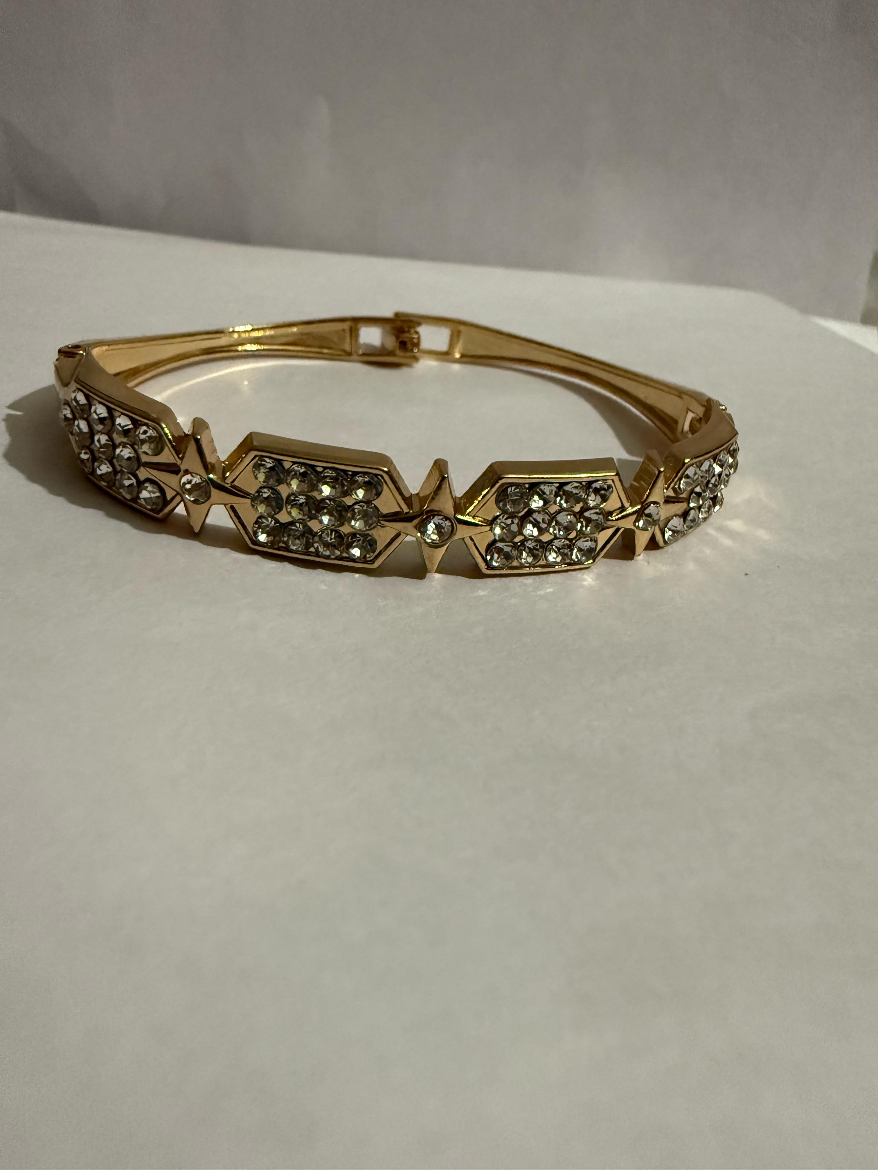 Elegant Gold-Toned Bangle with Cubic Zirconia Stones - Perfect for Any Occasion