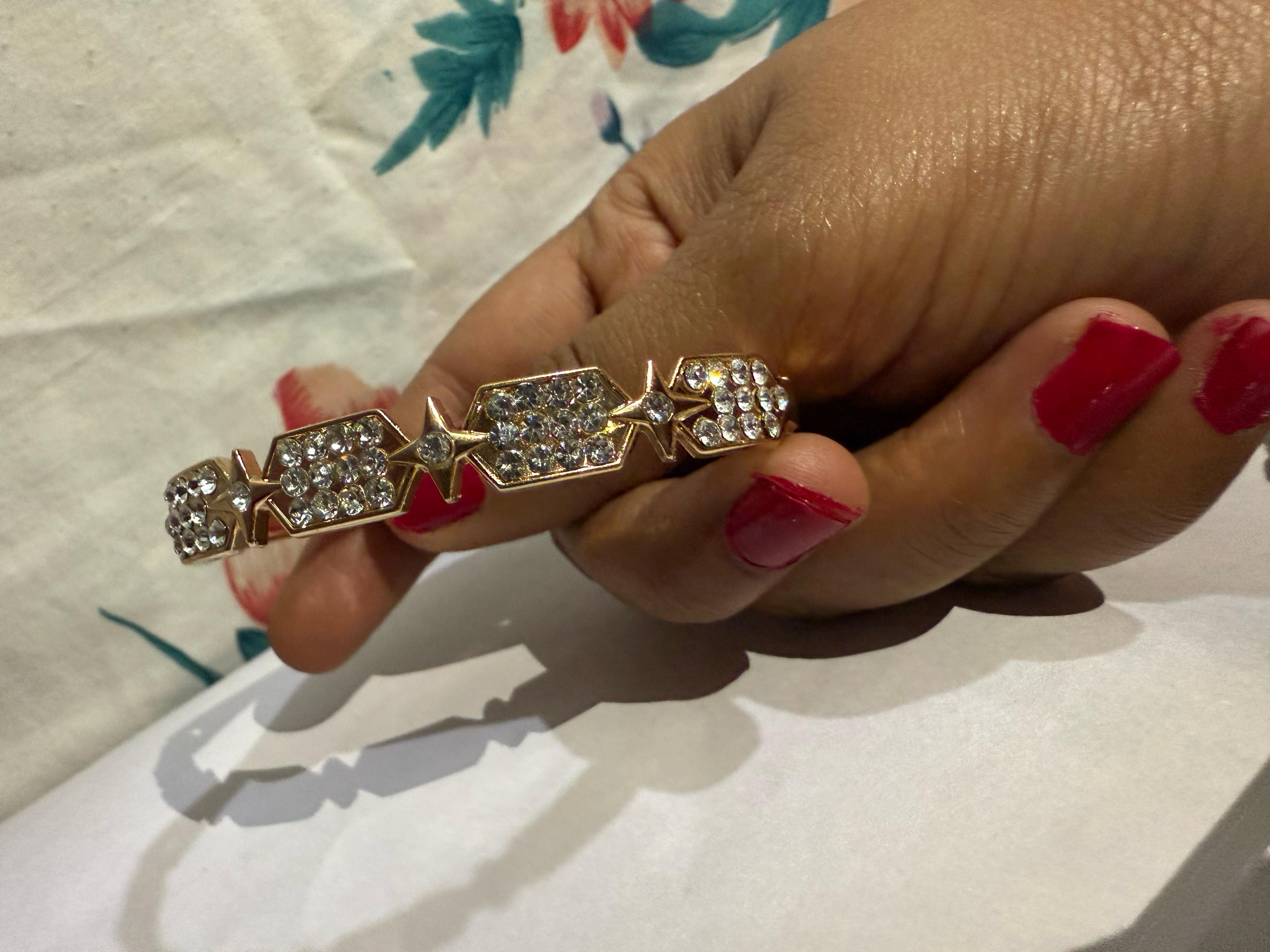 Elegant Gold-Toned Bangle with Cubic Zirconia Stones - Perfect for Any Occasion