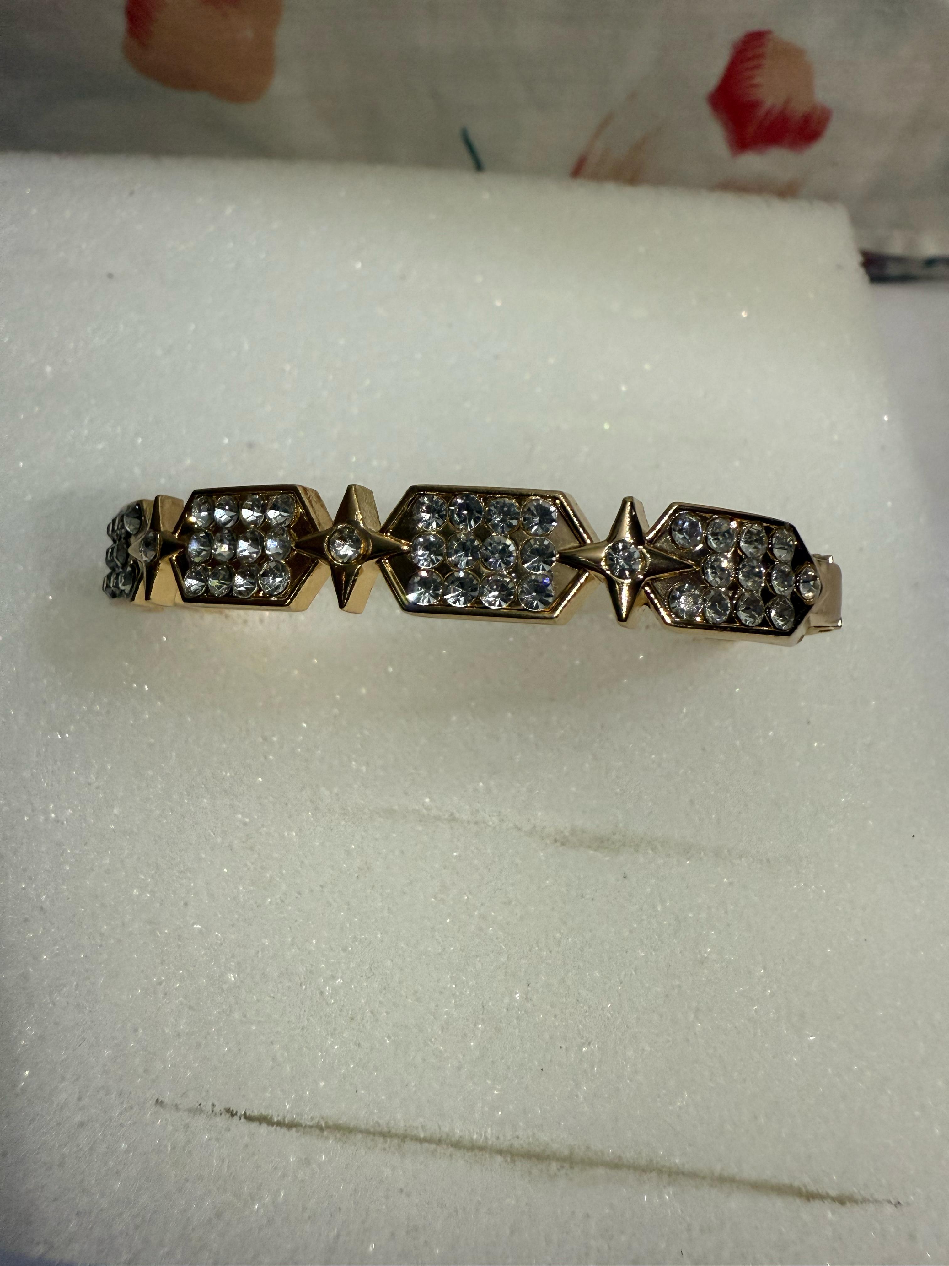 Elegant Gold-Toned Bangle with Cubic Zirconia Stones - Perfect for Any Occasion
