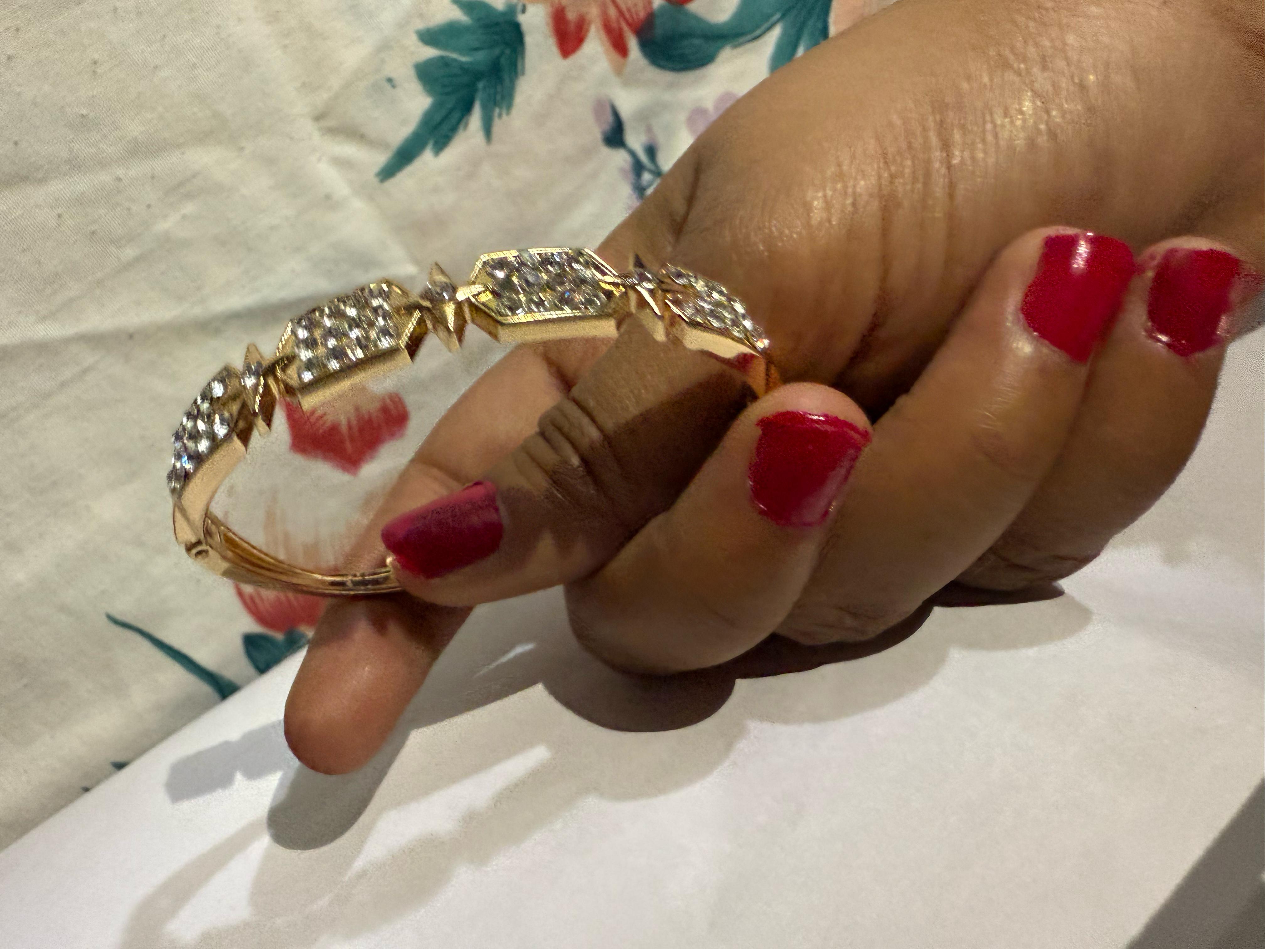 Elegant Gold-Toned Bangle with Cubic Zirconia Stones - Perfect for Any Occasion